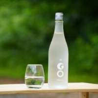 GO TERRACE, a premium Junmai Daiginjo brewed from 100% Uonuma Koshihikari table rice, polished to 50%. Frosted glass bottle of GO TERRACE Junmai Daiginjo sake by TSUNAN SAKE BREWERY, showing the GO logo and TERRACE wordmark.